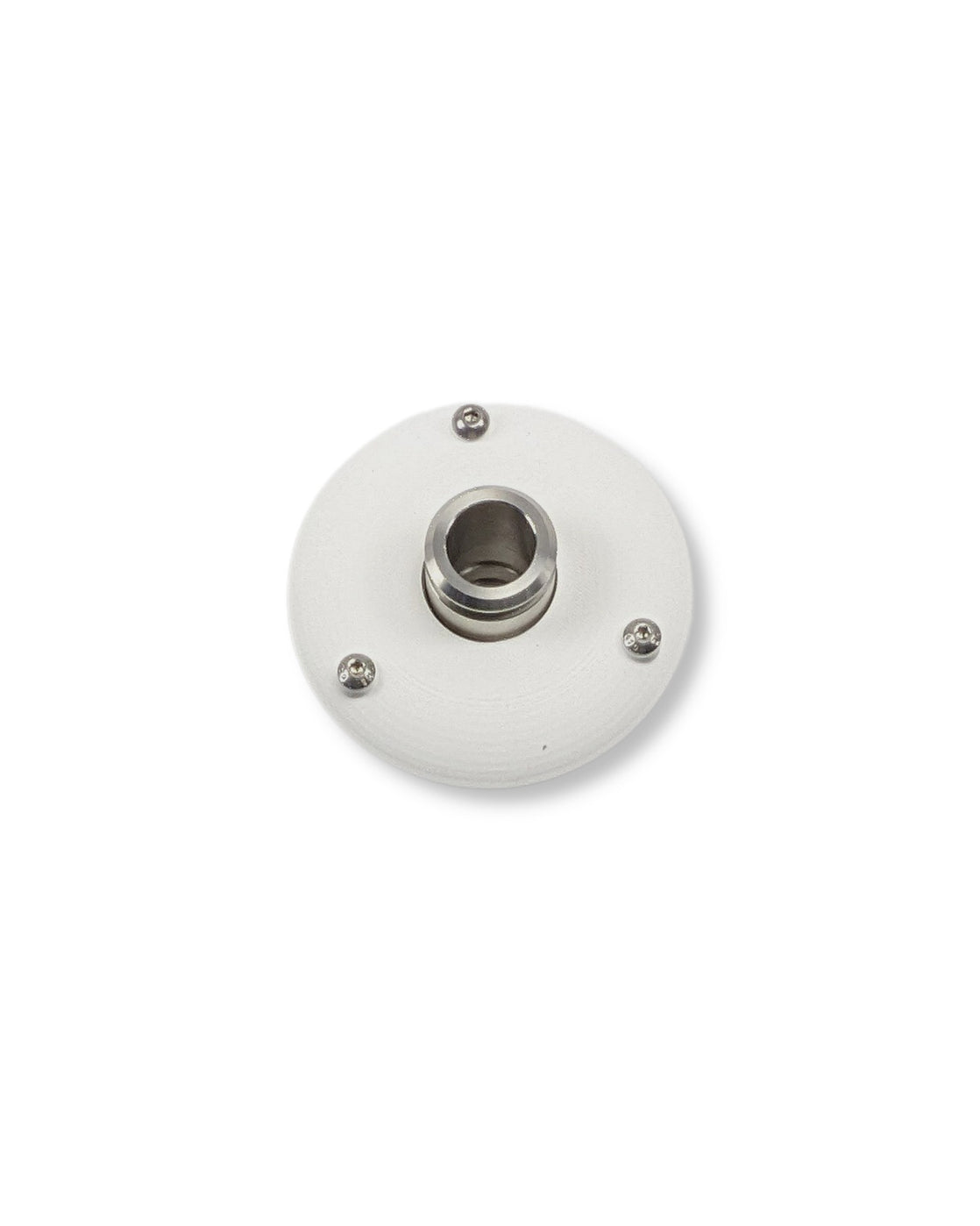 Ein weißer runder Knopf auf einer weißen Oberfläche mit dem UV Concept GmbH PURION IBC Universal 17W SPL BS Tank-Set für verbesserte Trinkwasserqualität und Schutz vor Verkeimungen.