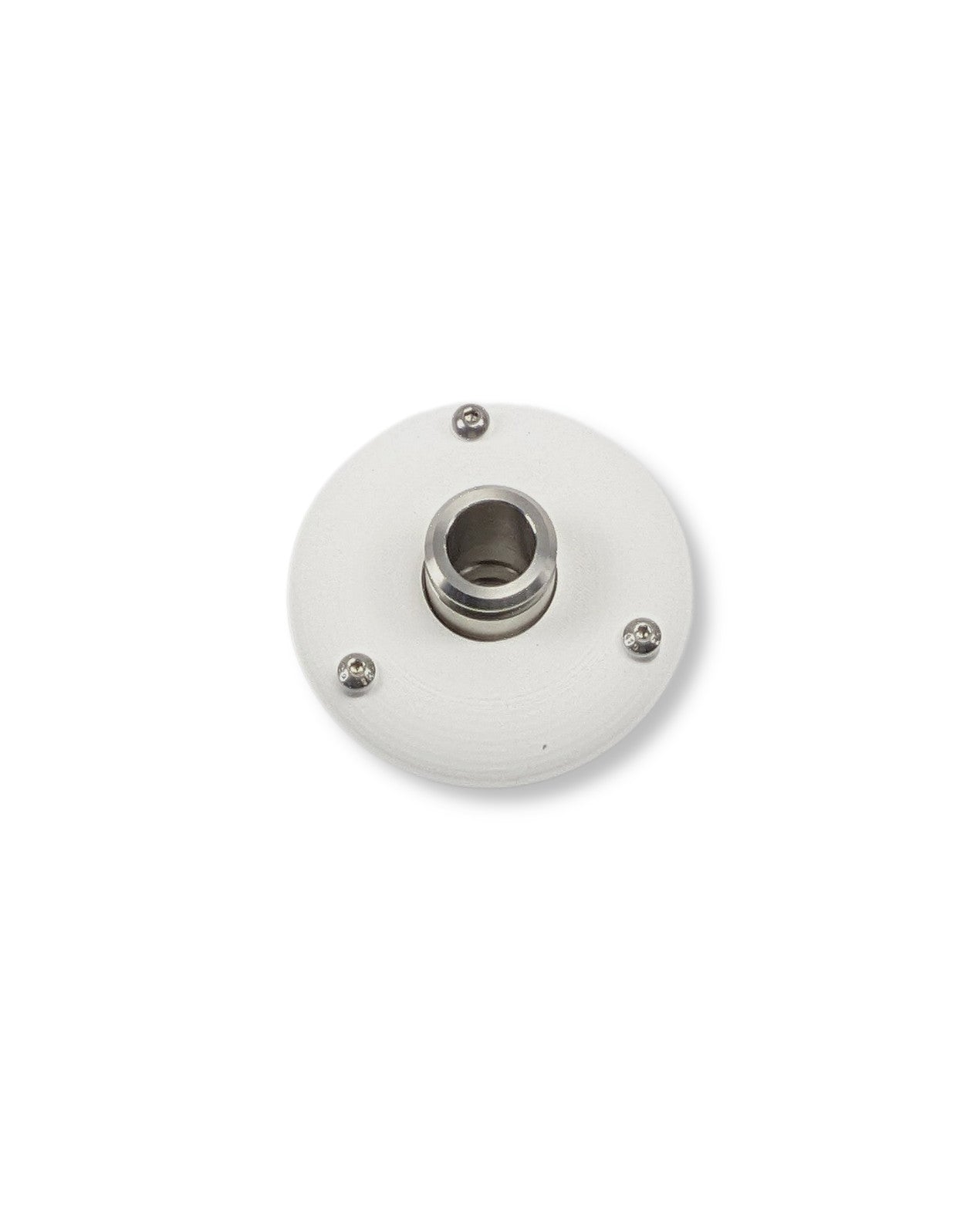 Ein weißer runder Knopf auf einer weißen Oberfläche für PURION IBC Universal 48W SPL BS von UV Concept GmbH zur Vermeidung von Verkeimungen.