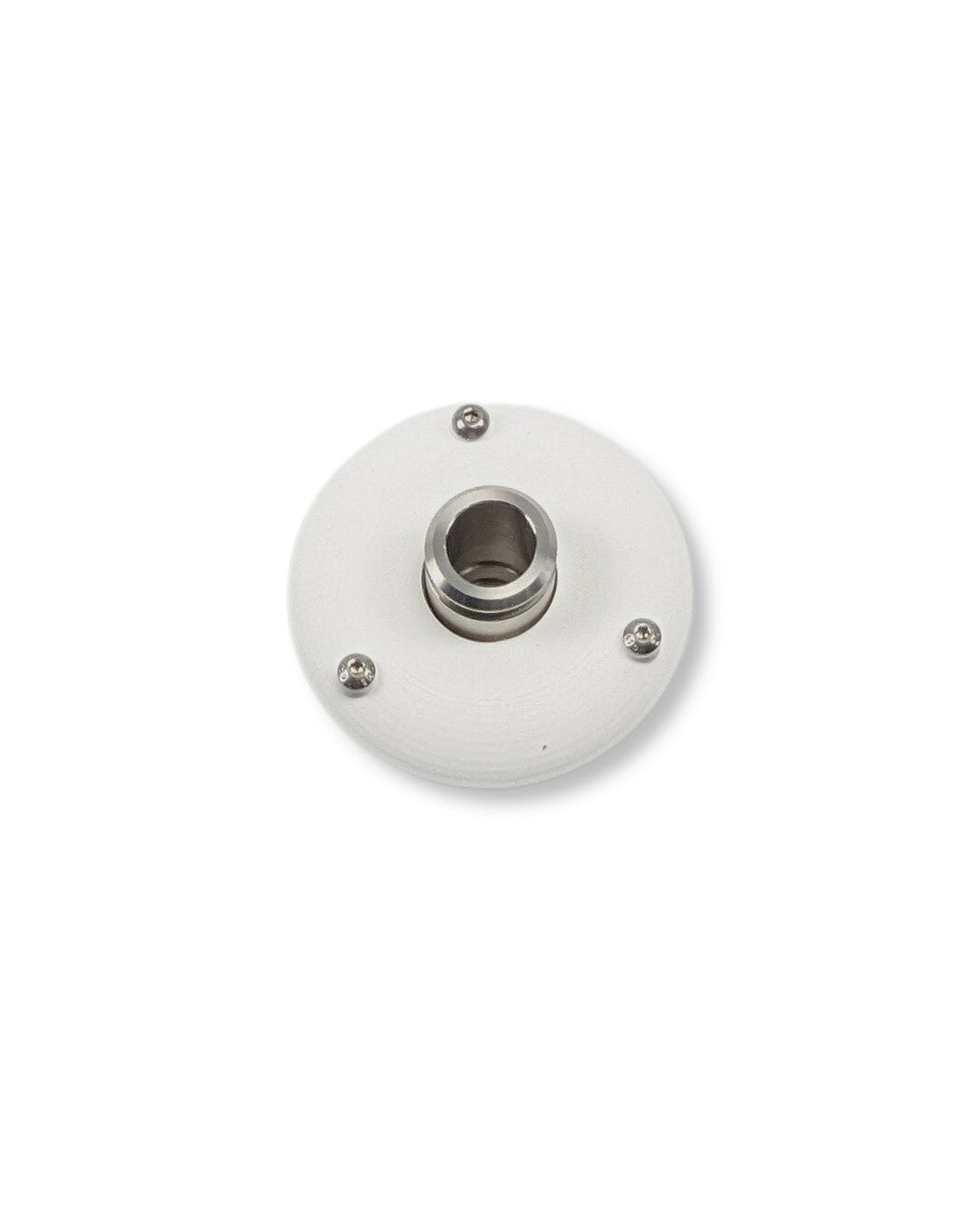 Ein weißer runder Knopf auf einer weißen Oberfläche, Teil des PURION IBC Universal 90W SPL BS, konzipiert für trübes Wasser und verwendet in Durchflussanlagen der UV Concept GmbH.